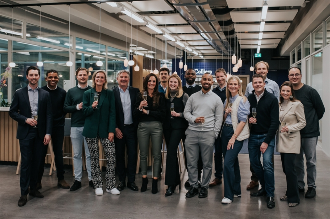 Colliers viert promotie van 17 medewerkers